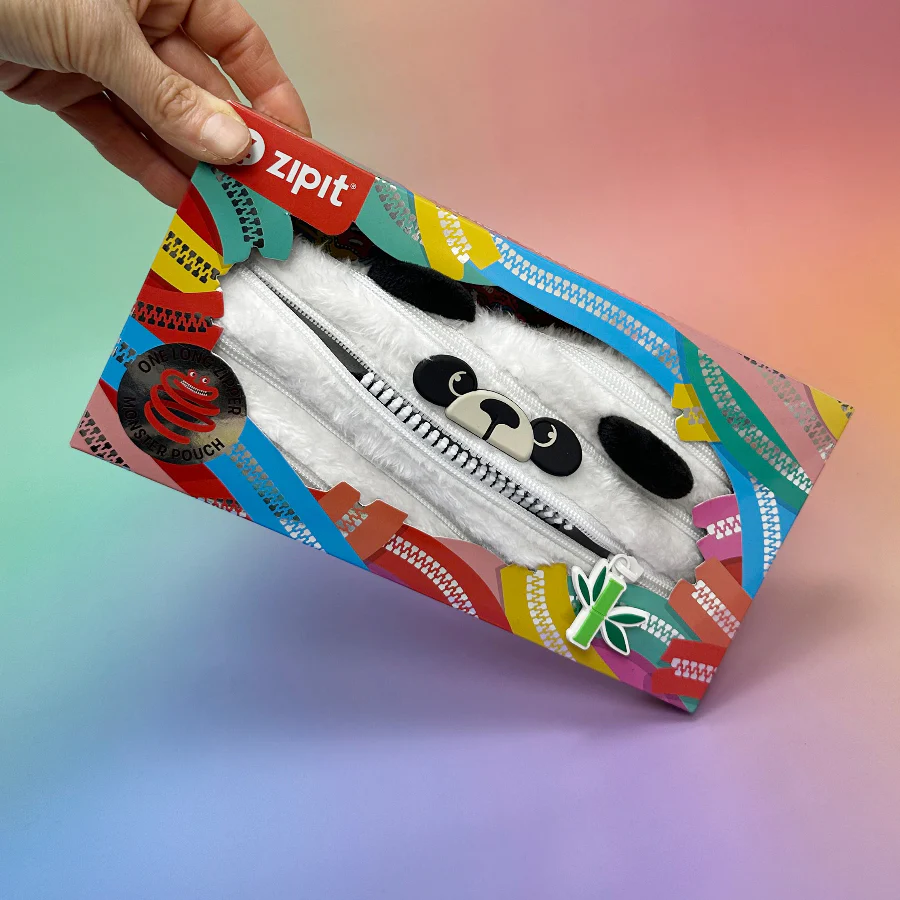 Colorful zipit pouch with panda design held by a hand against a gradient background
