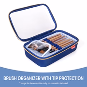 Blue brush organizer with makeup brushes inside on a white background