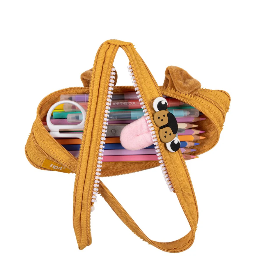 Yellow pencil case with cartoon dog face design on a white background